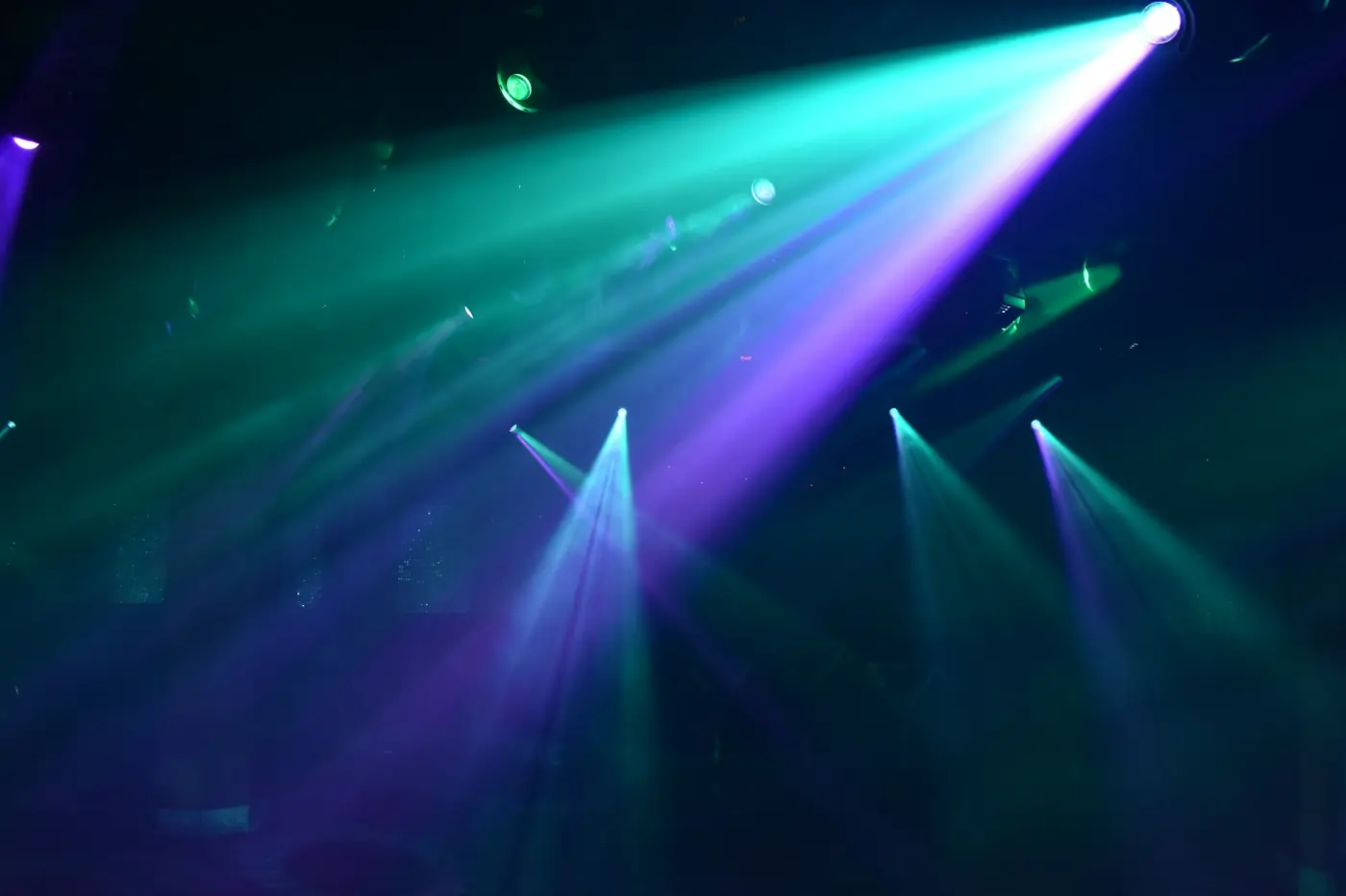 Beam lights cutting through haze