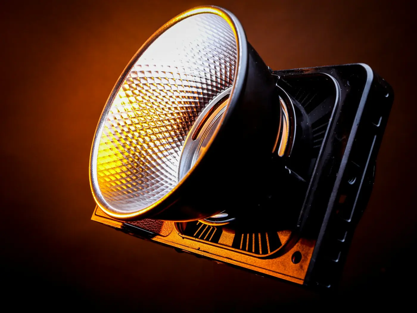 LED flood with faceted reflector