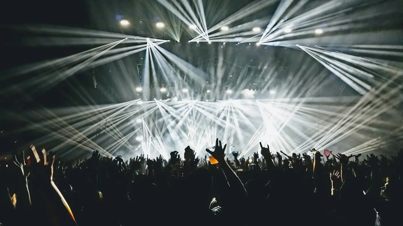 White beams over a crowd
